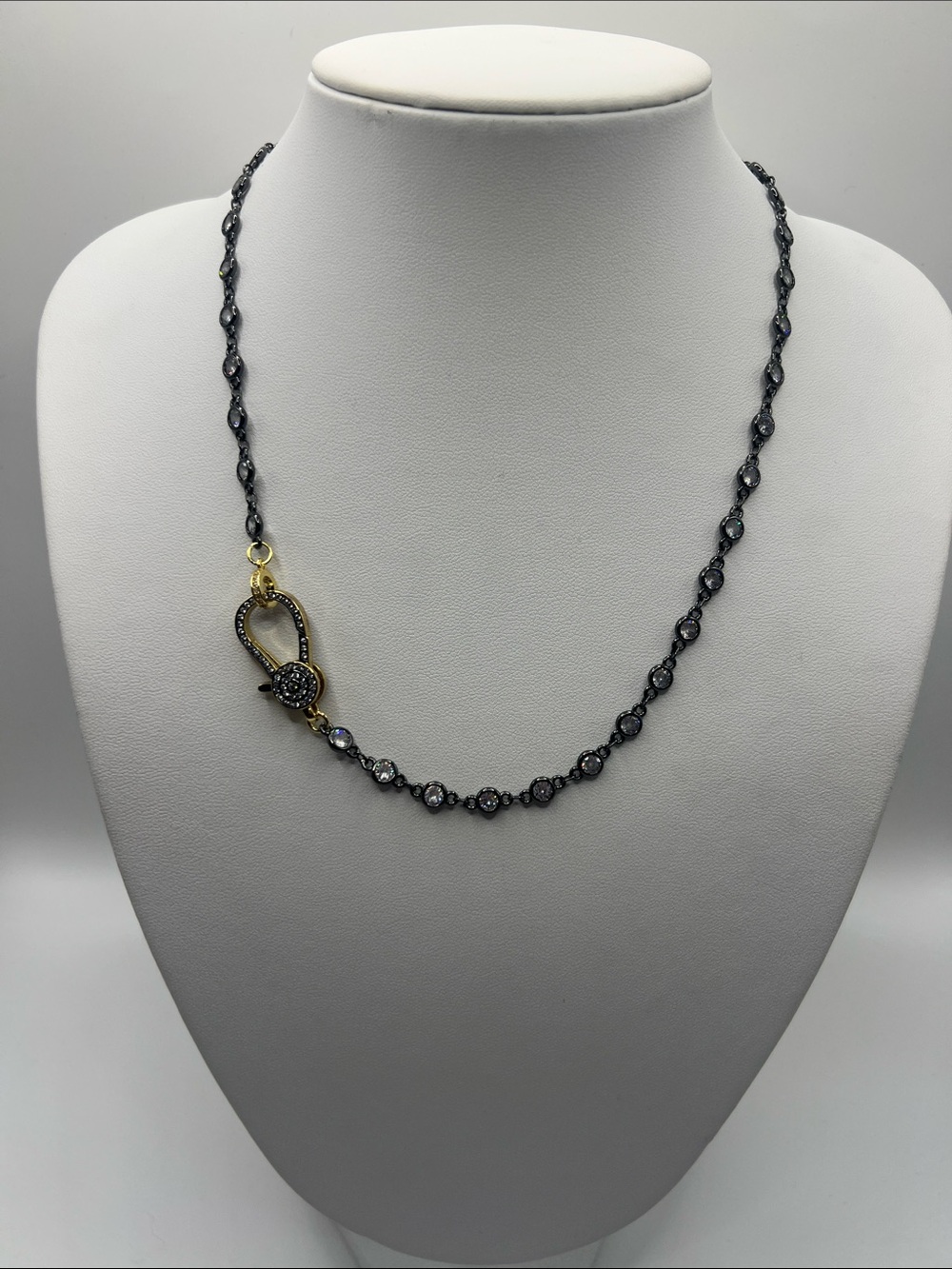 834. Diamond by the Yard Black Metal and Crystal Accent Necklace 18”